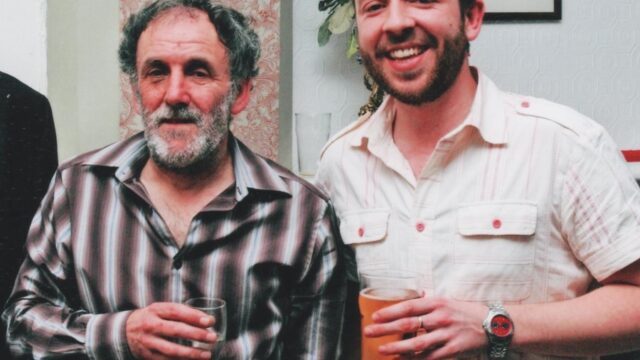 John and his dad, with pints in their hands