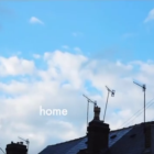 A rooftop and sky