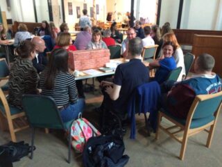 Photograph from the event shows people engaging in activites