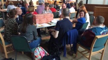 Photograph from the event shows people engaging in activites