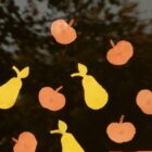 poem: photo of cut out paper apples and pears