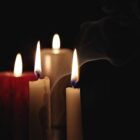 candles burning in the darkness