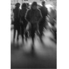 blurred image of people moving