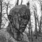 wooden sculpture of a man