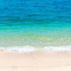 waves landing on a beach