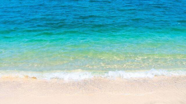 waves landing on a beach