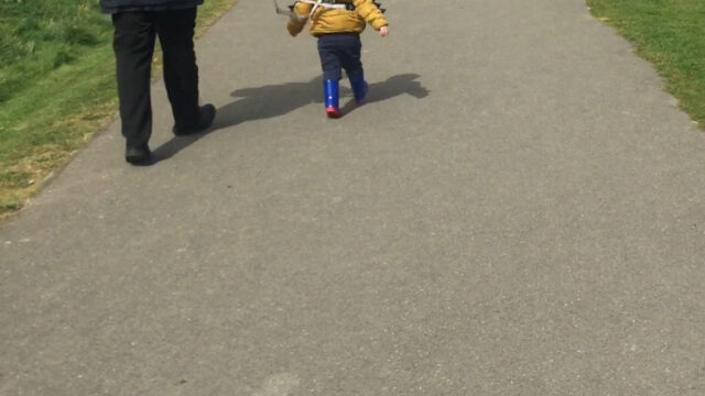 Ruth's husband and son on a walk
