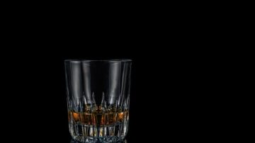 Sobriety and mindful meditation image of glass of spirits
