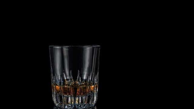 Sobriety and mindful meditation image of glass of spirits
