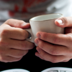 hands with mug