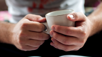 hands with mug