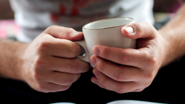 hands with mug
