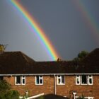 Rainbow over semi detached house