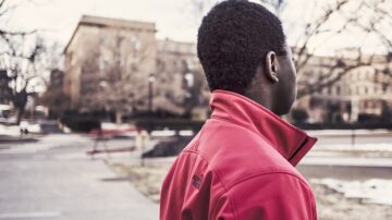 Black man turned away from camera