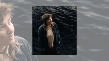 Photograph of Hazel standing by a body of water