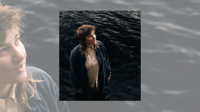 Photograph of Hazel standing by a body of water
