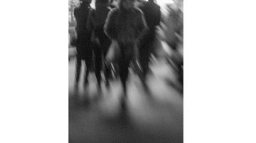 blurred image of people moving