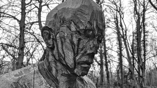 wooden sculpture of a man