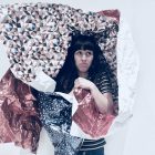 woman wrapped in paper