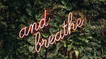 lit up text saying 'and breathe'