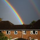 Rainbow over semi detached house
